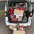 Sternschnuppenaktion 2025 Ein offener Kofferraum voller Geschenke