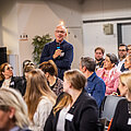 Veranstaltungsbericht Wortmedung eines Mannes aus dem Publikum des Symposiums.